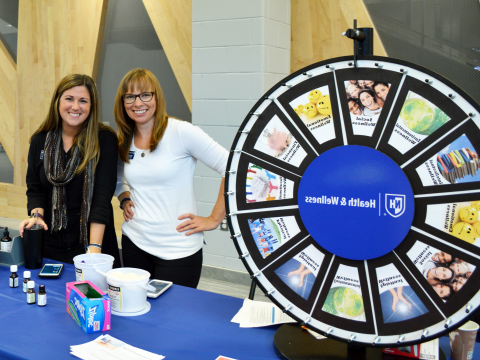 Dawn and Shannon with Wellness Wheel